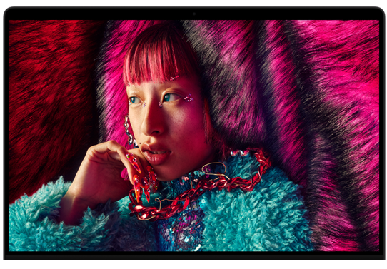 A colorful portrait photo showcases the clarity of the Liquid Retina XDR display